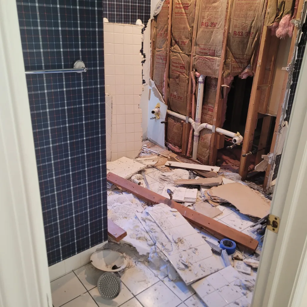 Bathroom remodel in New Jersey — bathroom torn out to the subfloor during demolition